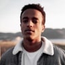 profile-image of Victor Crest, a brown young gentle man wearing a white tee and greenish leather jacket 